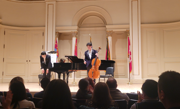 Benjamin Kim performing on cello